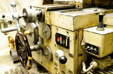 Metalworking workshop, metal processing machines. Levers of control of the machi Stock Photos