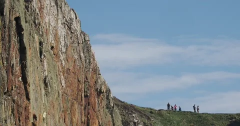 Metamorphic sea cliffs at South Stack, Anglesey, Wales, UK. Stock Footage 240093163