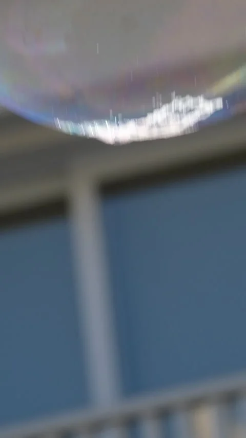 Metamorphosis of big soap Bubbles in Slow Motion. Close up view of beautiful big Stock Footage 302079828