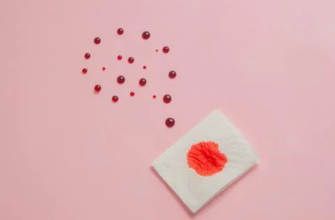 Metaphor of the anus on a pink background. concept of the cause rectal bleeding Stock Photos