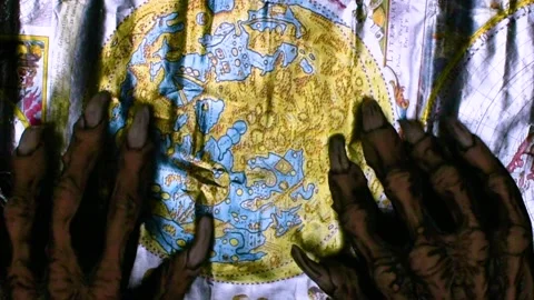 Metaphorical paws of the devil and ancient map of the world Stock Footage 229957952