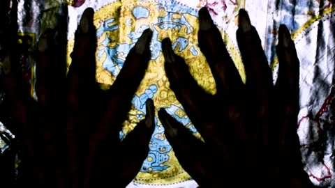 Metaphorical paws of the devil and ancient map of the world Stock Footage 229957962