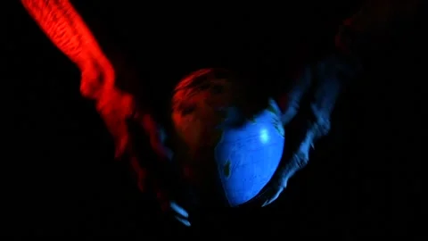 Metaphorical paws of the devil play with the planet Earth Stock Footage 221272156