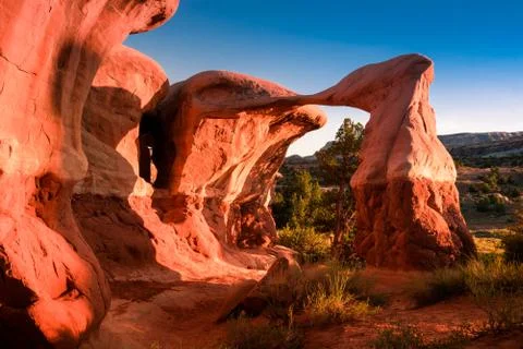 Metate arch at sunset in devil's garden Stock Photos