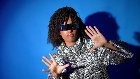 Metaverse user navigating virtual reality with futuristic visor Stock Footage 301369820