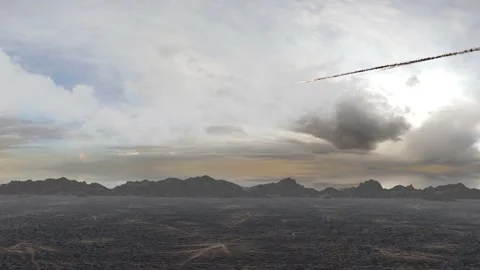 Meteor Asteroid or Missiles falling from the sky over desert Stock Footage 219965555