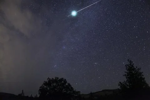 Meteor fireball explodes in a flash Stock Photos