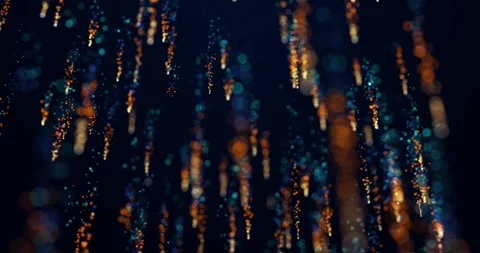 Meteor shower of bright particles, particles glow fall and rotate around its Stock Footage 241786602