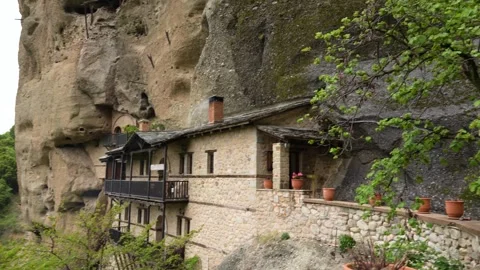 Meteora Greece Monastery Tilt Down to Reveal Church with White Smoke. Built.. Stock Footage 334888074