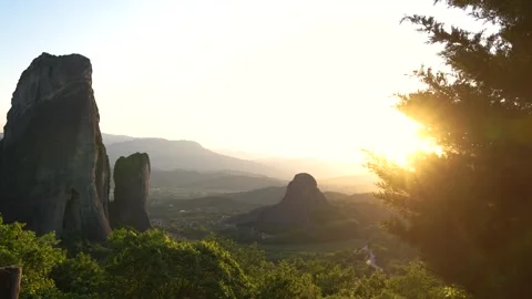 Meteora Greece Stunning Rocks Sunset Light Flare Reveal From Behind Tree. U.. Stock Footage 334886257
