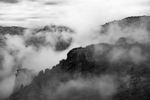 Meteora monastery complex, Greece. Orthodox monastery on the rock, emerging.. Stock Photos