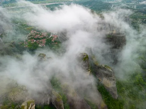 Meteora monastery complex, Greece. Orthodox monastery on the rock, emerging.. Stock Photos