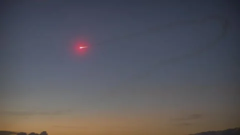 Meteorite falls to earth. Sunrise Red metorit Stock Footage 259171416