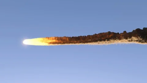 Meteorite flies in the blue sky Stock Footage 97222858