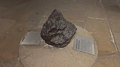 Meteorite on Round Stone Base Seen From Different Angles, Colombia 8K Stock Footage 331513024