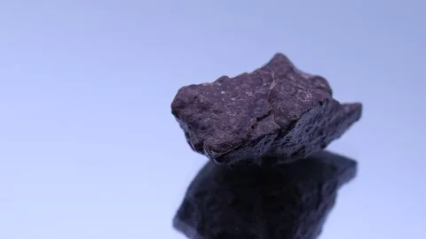 Meteorite stone rock sample in rotation ... | Stock Video | Pond5