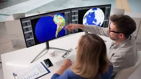 Meteorologist Studies Global Climate Patterns On Computer Stock Footage 331519623