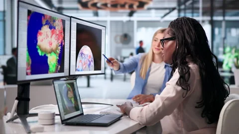 Meteorologists Analyzing Hurricane Data On Computer Stock Footage 343884718