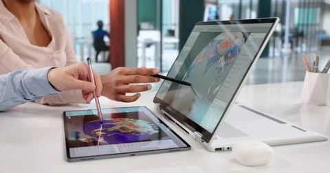 Meteorologists Using Computer Data To Track Hurricane In The Office. A Divers Stockfoto's