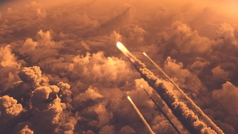 Meteors flying over the clouds Stock Footage 129381932