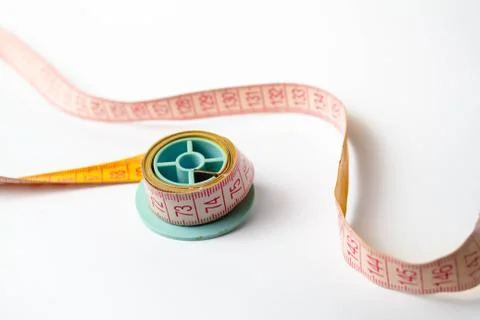 Meter for fabric on a white background isolate Stock Photos
