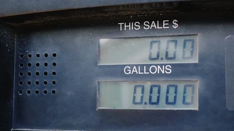 The meter shows the amount of fuel in gallons and the dollar amount. Refueling Stock Footage 98295524