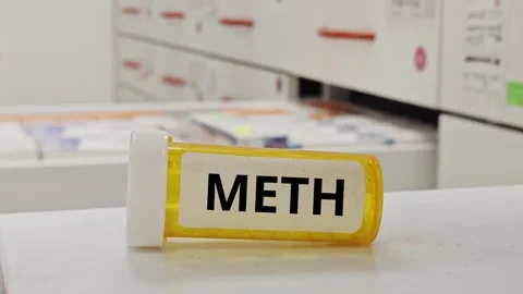 METH tablets representing stimulant methamphetamine affecting central nervo.. Stock Footage 338258656