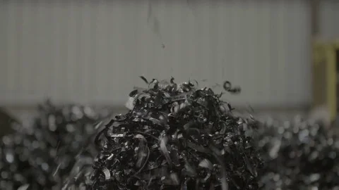 Methal landing in a large pile Stock Footage 69773261