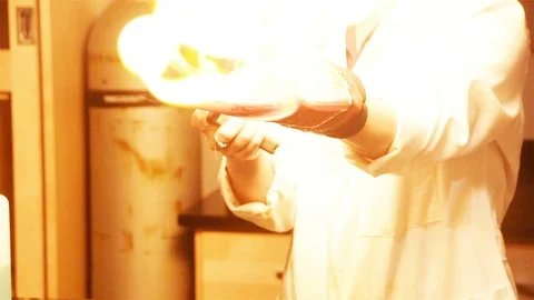 Methane bubbles set on fire Stock Footage
