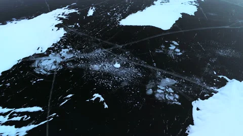 Methane bubbles trapped in Arctic ice, frozen transparent surface Stock Footage 149762126