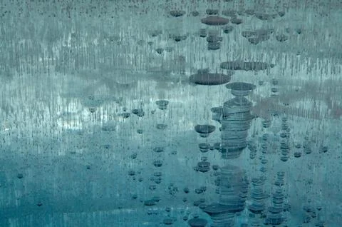Methane Bubbles Trapped In Lake Ice. Natural Winter Abstract Stock Photos