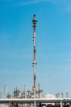 Methane Gas Fire High Flare Stack Flaring Tower Platform in Refinery Petrol.. Stock Photos