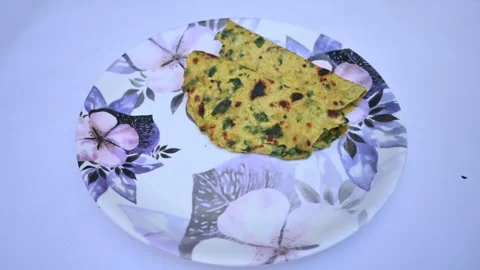 Methi paratha or fenugreek flatbread. Stock Footage 259552348