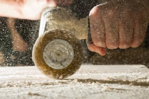 Method of artificial aging of wood. Drill with a wire brush. Stock Photos