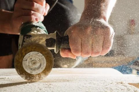 Method of artificial aging of wood. Drill with a wire brush. Stock Photos