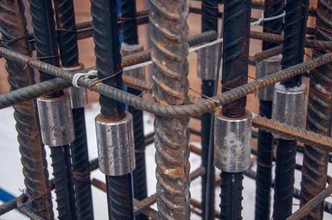 The method of connecting reinforcing bars for concrete work at a construction Stock Photos
