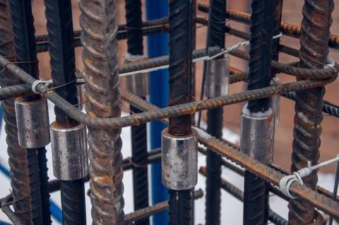 The method of connecting reinforcing bars for concrete work at a construction Stock Photos