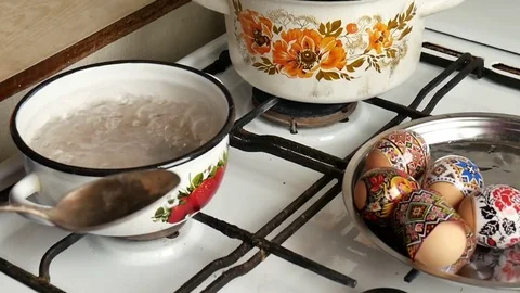 The method of staining Easter eggs with a thermoscorer. New technology, teaching Stock Footage 75857667
