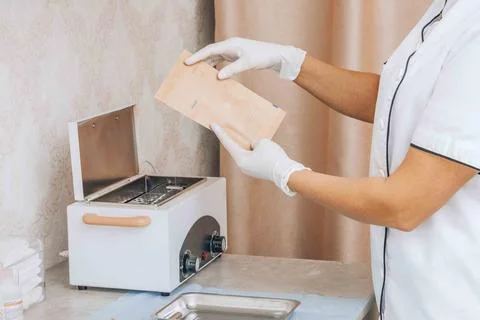 Methodical Preparation: The Art of Instrument Sterilization in Healthcare Stock Photos