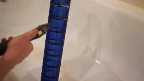 Methods for Effectively Cleaning Pool Filter Cartridges Inside a Bathtub with Stock Footage 309600694