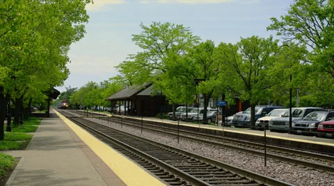 METRA TRAIN ARRIVES AT LAKE FOREST, ILLINOIS # 4 Stock Footage