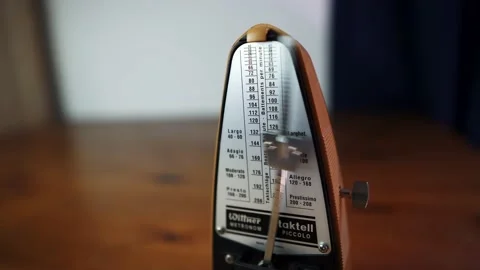 Metranome in the corner of the table close-up ticking in 4K 動画素材 196736184