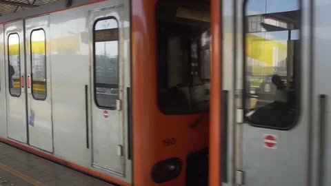 Metro arriving in underground Stock Footage 129257403