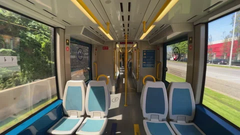 Metro do Porto - Empty Tram moving over green grassy rail Portugal subway 動画素材 209315990