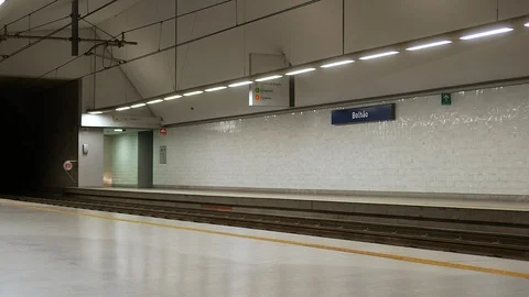 Metro do Porto underground train arriving in Bolhao station at night Stock Footage 103852715