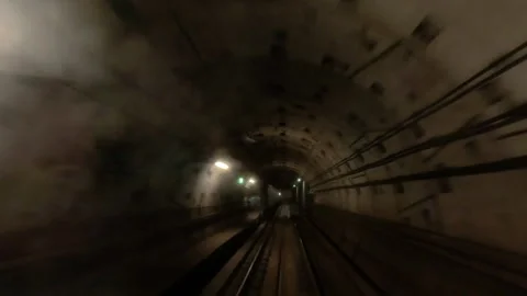 Metro. Fast motion shot of a train moving in a tunnel. Stock Footage 289584383