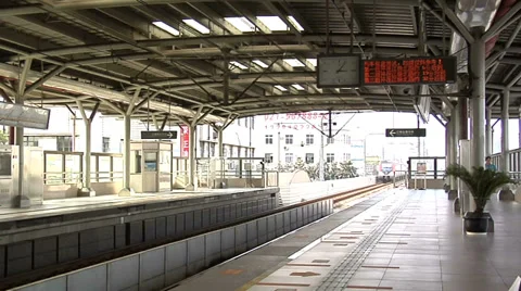 Metro Line No. 3 pulls into a Station Stock Footage 38599285