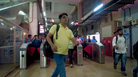 Metro Line People Walking Through Turngates Check Point. Stock Footage 258323955