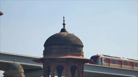 Metro Line Train Passing Through Ancient Monument In Lahore, Pakistan 5 May 2024 Stock Footage 274222863
