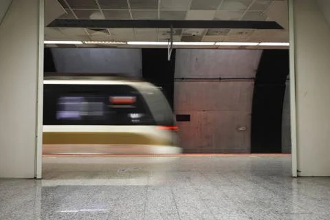 Metro moving in a Station Stock Photos